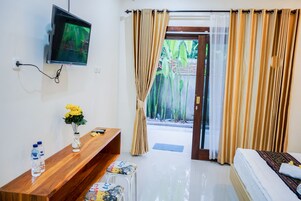 Premium bedding, down comforters, pillowtop beds, in-room safe