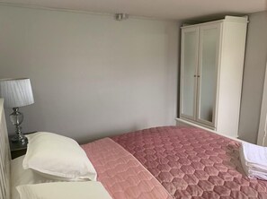 2 bedrooms, blackout curtains, iron/ironing board, free WiFi