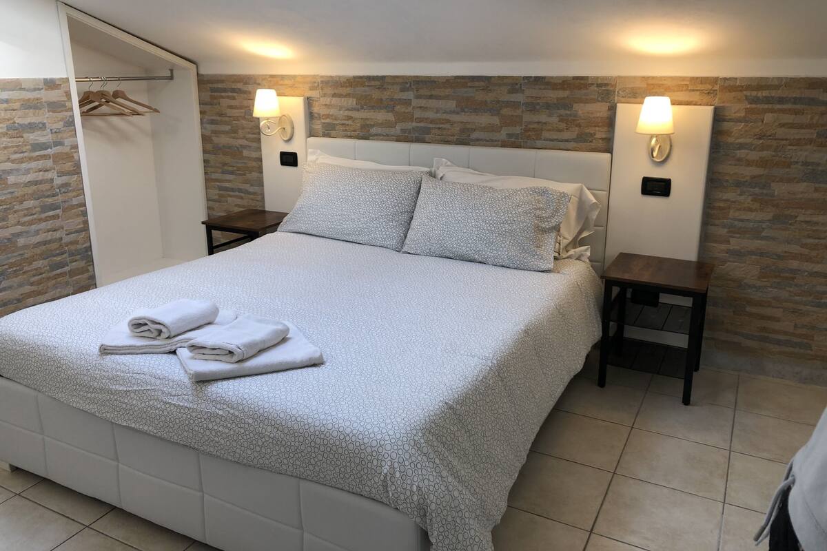 Premium bedding, down duvets, memory-foam beds, desk