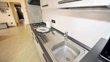 Réfrigérateur, four, plaque de cuisson, lave-vaisselle