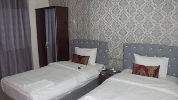 Kamar Twin Deluks, 2 Tempat Tidur Twin, Boleh Merokok, pemandangan kota | Wi-Fi gratis