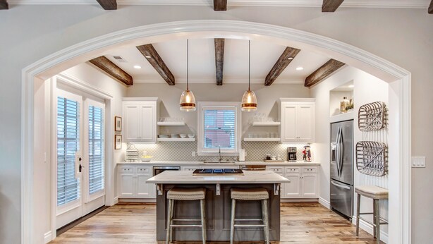 A spacious kitchen with a large island, wooden beams on the ceiling, and pendant lighting. - Brand New 2 Bedroom Master Suites with Chefs Kitchen Steps to Sonoma Plaza (Sonoma)