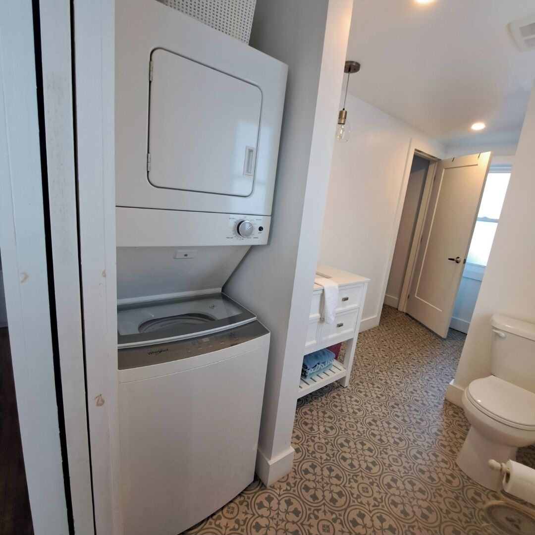 Combined shower/bathtub, hair dryer, towels, soap