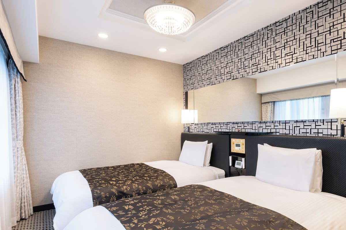 Deluxe Twin kamer | Een bureau, verduisterende gordijnen, gratis wifi, beddengoed