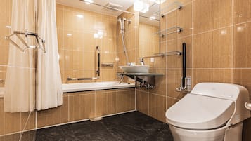 Kahden hengen deluxe-huone (kaksi sänkyä) | Kylpyhuone | Suihkun ja ammeen yhdistelmä, ilmaiset hygieniatuotteet, hiustenkuivaaja