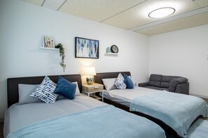 Apartamento família, várias camas, para não fumantes, vista para o jardim | 3 quartos, Wi-Fi de cortesia
