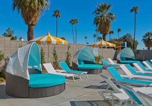 Outdoor pool, free cabanas, pool umbrellas