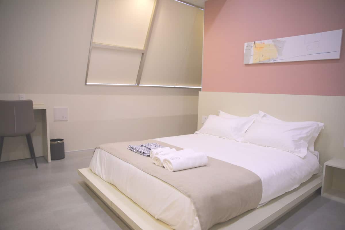 Desk, laptop workspace, free cots/infant beds, rollaway beds