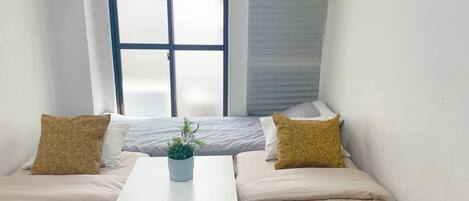 Fer et planche à repasser, draps fournis