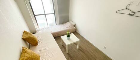 Fer et planche à repasser, draps fournis