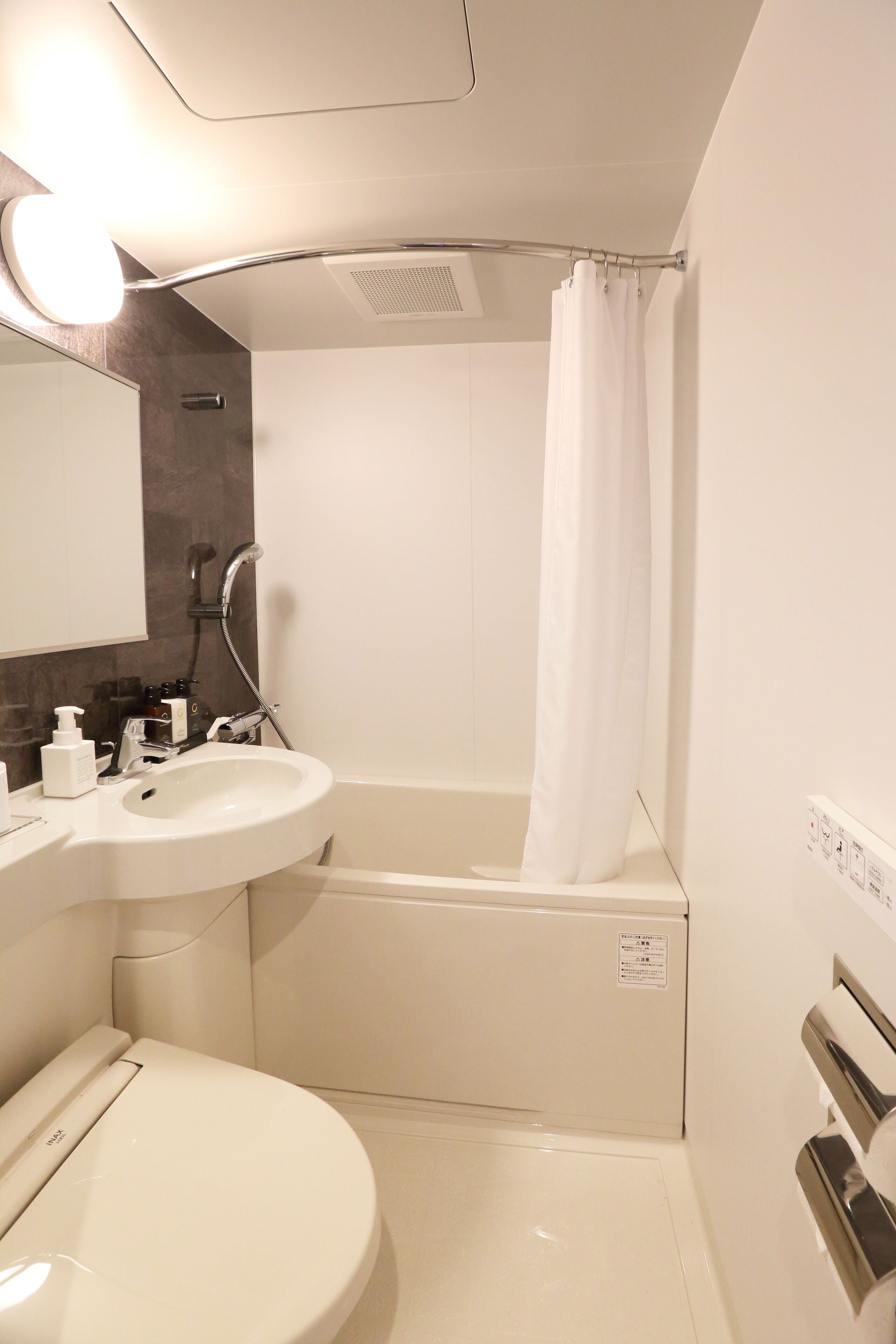 free toiletries, hair dryer, slippers, bidet