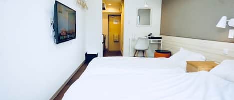 Family Triple Room | Desk, blackout drapes, iron/ironing board, free WiFi