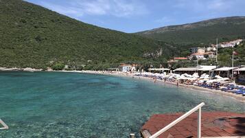 Beach nearby, sun loungers