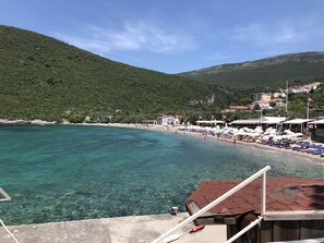 Beach nearby, sun loungers