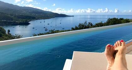 Villa de lujo, vista de la bahía de Malendure, reserva Cousteau y piscina de sal