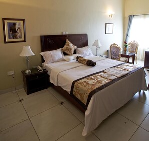 Desk, laptop workspace, blackout curtains, iron/ironing board