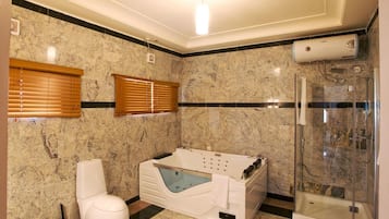 Shower, free toiletries, slippers, towels
