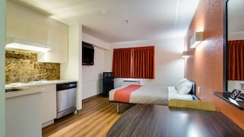 Deluxe Room, 1 Queen Bed, Non Smoking, Refrigerator & Microwave | Free WiFi, bed sheets