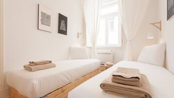 2 slaapkamers, een strijkplank/strijkijzer, gratis wifi, beddengoed