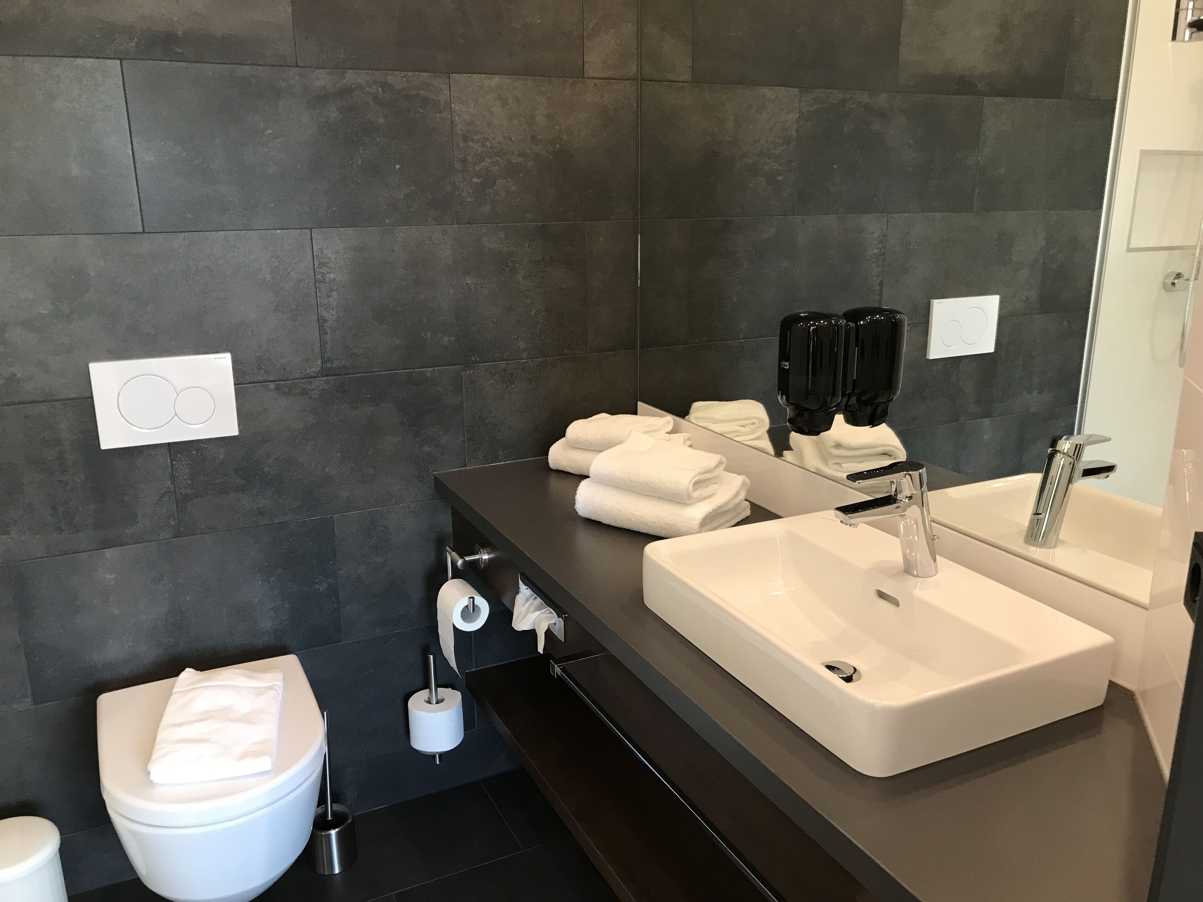 shower, rainfall showerhead, hair dryer, heated floors