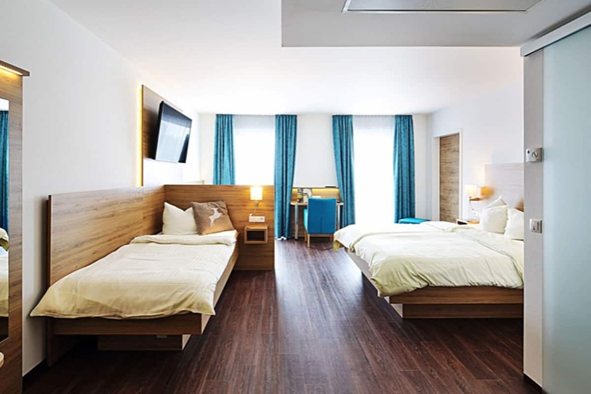 family room | 1 bedroom, individually decorated, individually furnished, desk