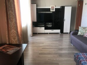 Huoneisto | 1 makuuhuone, silitysrauta/-lauta, ilmainen Wi-Fi, vuodevaatteet
