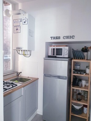 Appartamento, 1 camera da letto | Angolo cottura privato | Frigorifero con congelatore, microonde, piano cottura