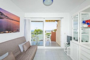 TV - 126-APARTMENT WITH VIEWS OF THE PORT OF ROSES (Roses)
