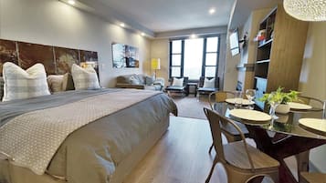 Een strijkplank/strijkijzer, wifi, beddengoed, rolstoeltoegang