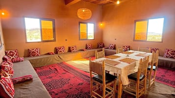 Breakfast, lunch, dinner served; local cuisine