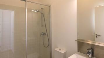 Bathtub, hair dryer, towels