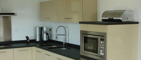 Parrilla de estufa y lavavajillas