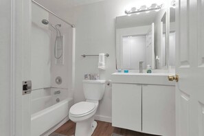 Bathtub, hair dryer, towels