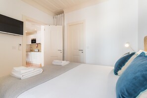 1 habitación, tabla de planchar con plancha, wifi gratis y ropa de cama 