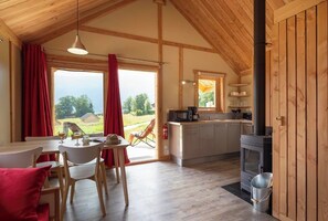 Deluxe Chalet | Living area | Foosball, table tennis