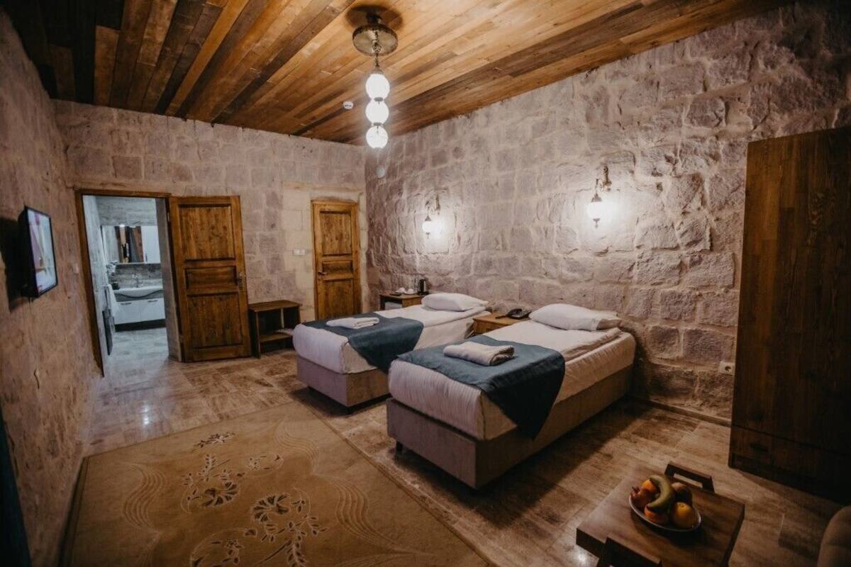 Habitación Deluxe con 1 cama matrimonial o 2 individuales | Wifi gratis y ropa de cama