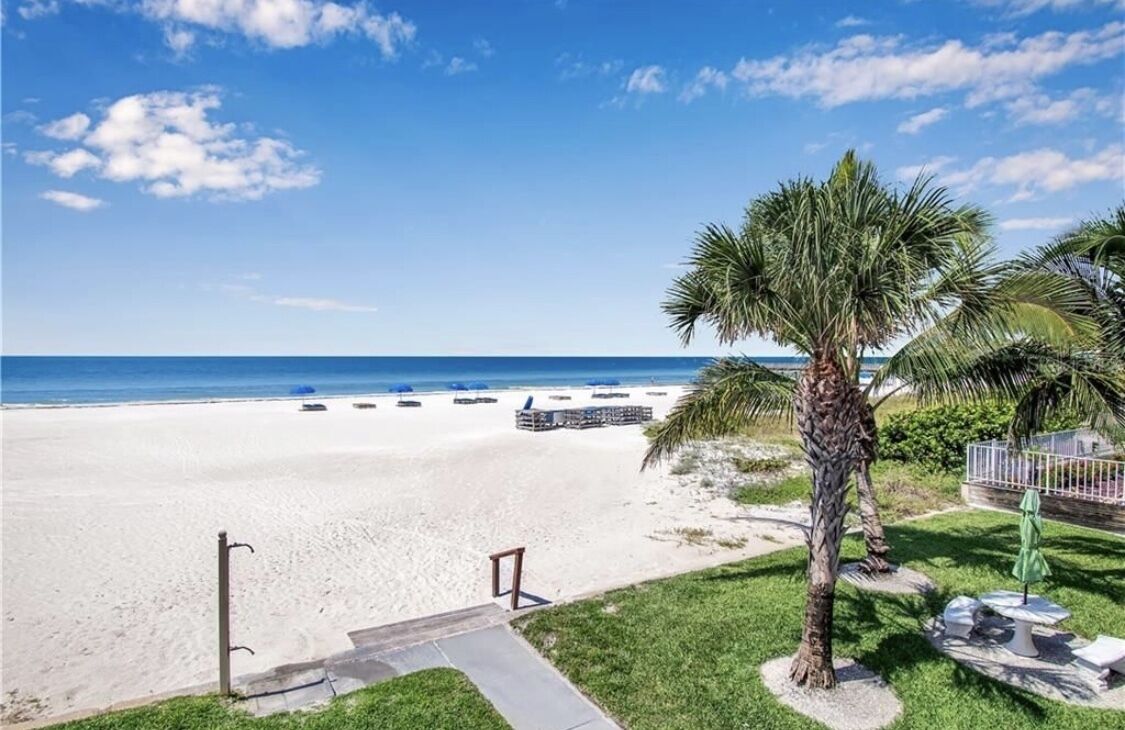 On the beach, sun loungers, beach towels