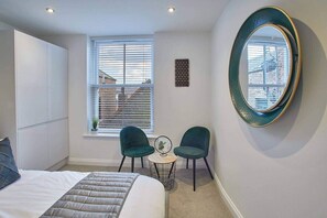 2 habitaciones, tabla de planchar con plancha y wifi gratis