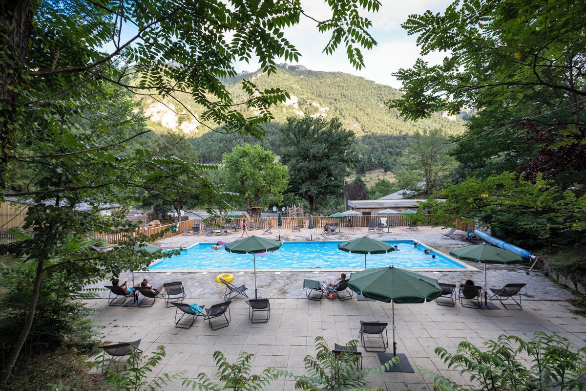 Seasonal outdoor pool, open 9:00 AM to 6:00 PM, pool umbrellas