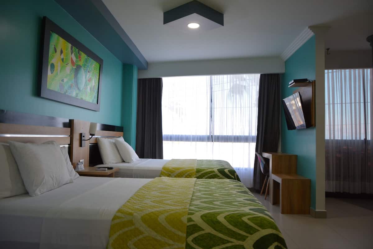 Suite Familiale | Coffres-forts dans les chambres, Wi-Fi gratuit