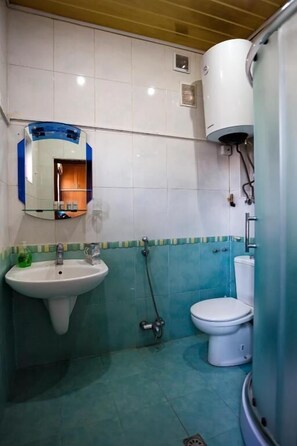Family Apartment, Balcony, Sea View | Bathroom | Shower, rainfall showerhead, hair dryer, slippers