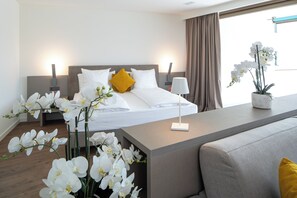 Junior Suite With Partial Lake View , Disability Access - First Floor | Hypo-allergenic bedding, down comforters, minibar, in-room safe