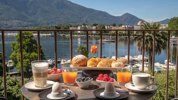 Junior Suite With Lake View - Top Floor | Hypo-allergenic bedding, down duvets, minibar, in-room safe