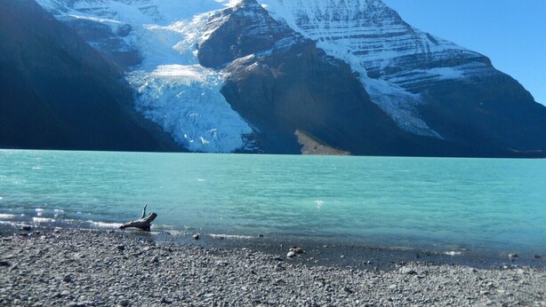 A glacier with a clear blue lake in the foreground and mountains in the background. - Mica Mountain Lodge & Mica cabin at Mt Robson Park, near Jasper National Park (Tête Jaune Cache)
