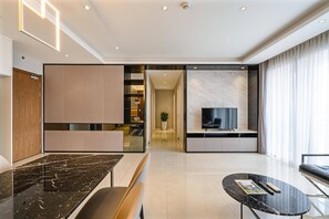 Luxury Apartment, 3 Bedrooms | Living area | 32-inch flat-screen TV with satellite channels, TV - Thai Anh House - Masteri Millenium (Ho Chi Minh City)