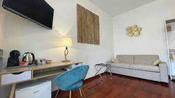 Comfort Quadruple Room | Premium bedding, down comforters, memory foam beds