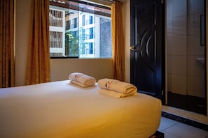 Quarto básico | Wi-Fi de cortesia, roupa de cama