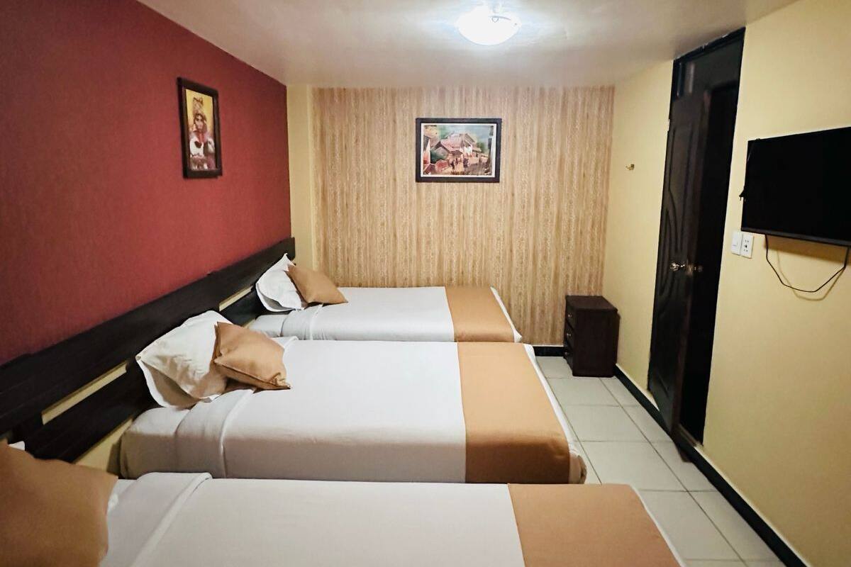 Habitación triple básica, 3 camas individuales | Wifi gratis y ropa de cama