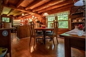 Dining - A modern "State of the Art" Log Cabin  nestled in a serene wooded property. (Accord)