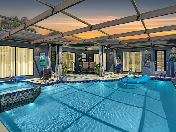 Outdoor pool, a heated pool - LAKEFRONT PROPERTY, LARGE HEATED POOL, newly renovated. Welcome to "Our Nest" (Port Richey)